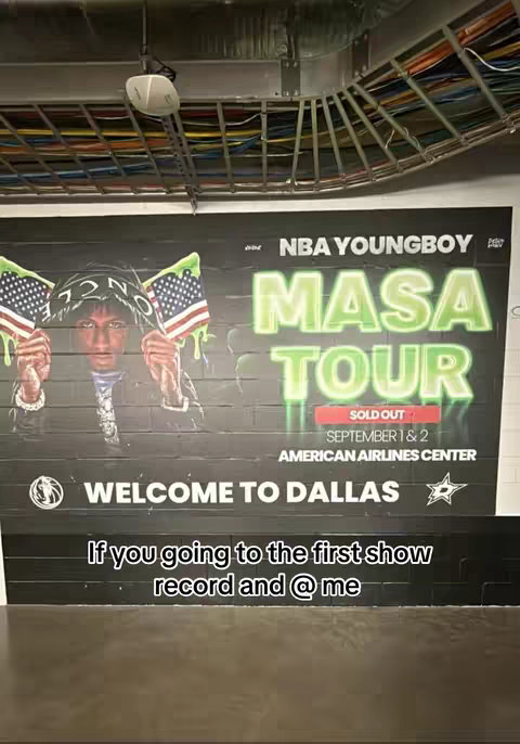 An image promoting the "MASA TOUR" with a poster of NBA Youngboy holding American flags in front of a sign that says "WELCOME TO DALLAS".