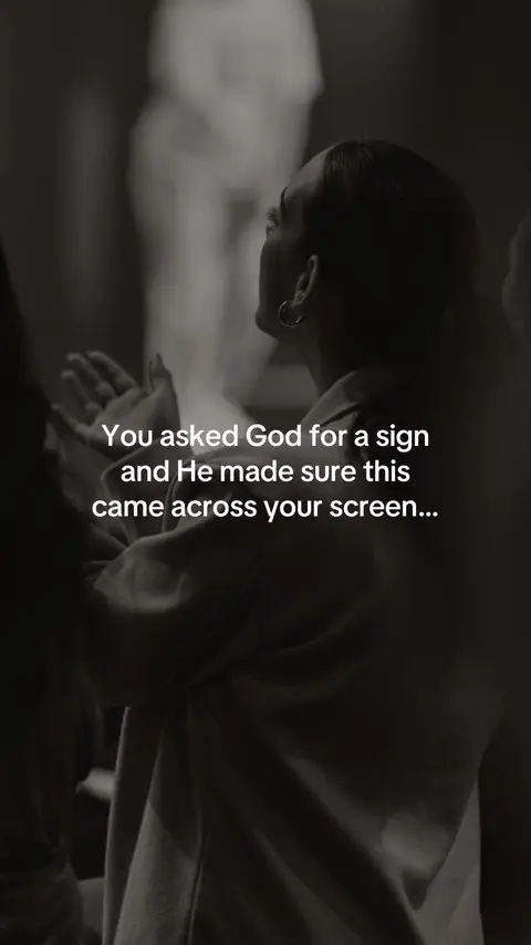 The cover image shows a woman in a dimly lit room, lit by an unknown source, looking up towards a blurred, bright, white figure. The woman's hands are raised in front of her as if in prayer. Text is overlaid on the image, with a message of divine guidance.
