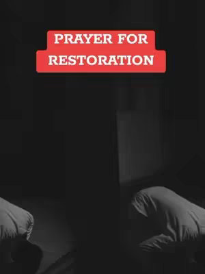 The image is a grayscale composition. In the foreground, there is an obscured figure kneeling in prayer. Behind the figure, the background is largely dark, with light gradually increasing vertically on the right, suggesting a wall. Overlayed on this backdrop is a rectangular red banner with white text. The text reads 'PRAYER FOR RESTORATION'.