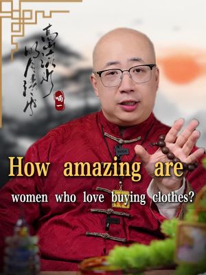 A photograph shows a man in a red jacket, glasses, and a shaved head, gesturing with his right hand while holding prayer beads in his left. The background has Chinese-style calligraphy and an indistinct landscape. Overlayed text asks, 'How amazing are women who love buying clothes?'
