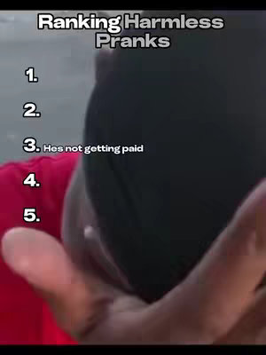 The cover image has text at the top indicating a ranking list of pranks, numbered one through five. The focus is on a person's hand, obscured for privacy. In the background is a body of water.