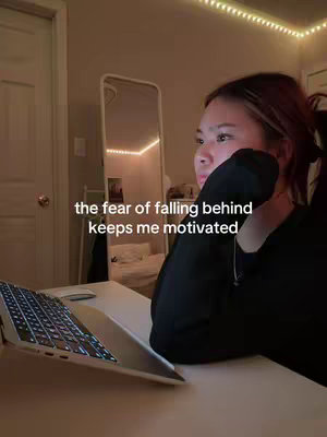 The image shows a person in a room with soft lighting, sitting at a desk. The person is Asian and seems to be studying at a desk with a laptop. The text overlayed is in white, located in the middle of the cover image.