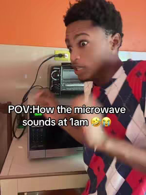 A person with a shocked expression stands in front of a microwave at 1 am, with a text overlay adding the context of the experience.
