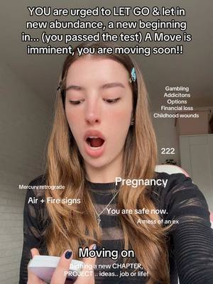 The cover image shows a young woman with long blonde hair looking directly at the camera with a surprised expression and an open mouth. Various text overlays are surrounding her, including words and phrases like "Pregnancy," "Moving on," and "222." Other highlighted keywords and phrases like "Mercury retrograde," "Air + Fire signs," "Gambling Addicitons," "Options," "Financial loss," "Childhood wounds," and related terms indicate a tarot reading or spiritual guidance context. The overall composition suggests a personalized astrological or psychic message.