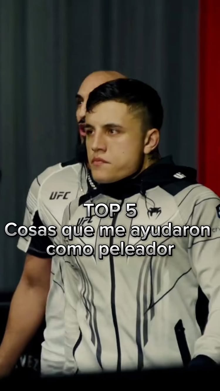 The cover image features a young man in a white jacket with black accents, with text overlayed. He appears to be in a professional setting, possibly related to sports or competition. Text overlays include "TOP 5" and "Cosas que me ayudaron como peleador".