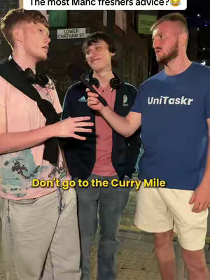 A street interview scene features three young men standing on a sidewalk. One man on the left is wearing a pink shirt, and another in the middle is wearing a blue jacket with a red shirt, and a man on the right is wearing a blue t shirt with "UniTaskr" logo, The background includes buildings and street signs.