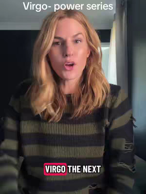 A woman with blonde hair and an olive green and black striped sweater is centered in the frame, looking directly at the camera with an open mouth. Above her, the text 'Virgo- power series' is visible in white text. Below her, a red rectangle with white text that says "VIRGO THE NEXT". The background is dark and slightly out of focus.