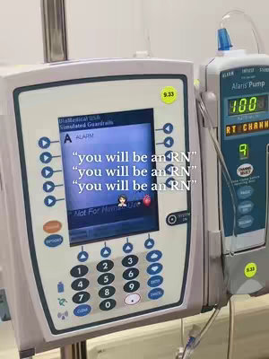The cover image features medical devices, specifically an IV pump and an infusion device, with text overlays. The primary focus is on the devices, suggesting a medical or healthcare context. The background is neutral, highlighting the equipment in the foreground which presents buttons and numerals.