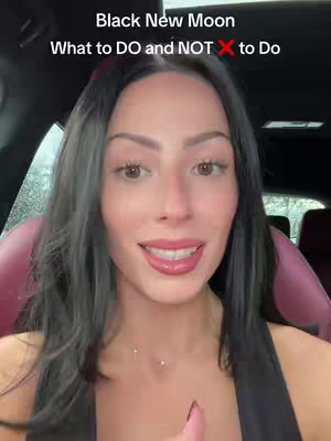 A woman with long dark hair is seated, likely in a car, looking directly at the camera. The overlay text reads 'Black New Moon, What to DO and NOT to Do'. The background is blurred, with a peek of a window.