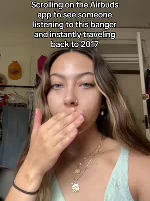 A young woman is shown in a selfie, covering her mouth with her hand. Text overlays the image, mentioning the Airbuds app and a throwback to 2017. The background is a room with a variety of items, including clothes and decorative items.