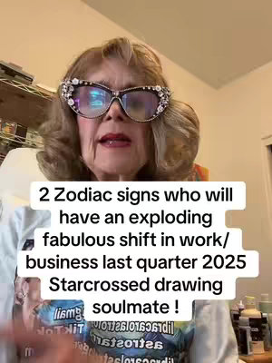 An older woman with curly blonde hair and large, bejeweled glasses is centered in the frame. Text overlays detail astrological predictions.