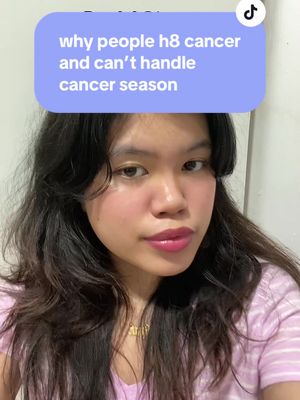 A selfie of a young woman with long, dark hair and pink makeup. A light blue rectangular text overlay is positioned above her head.