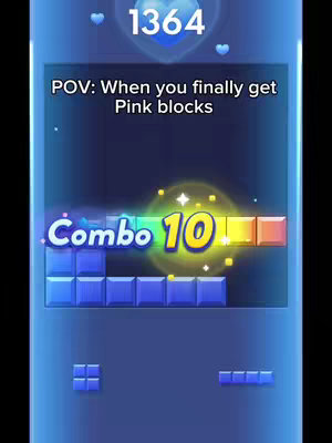 A vertical screen recording of a mobile game. At the top is a score of 1364 with a heart symbol. Below this is text overlay. The game field displays blue blocks. In the center is a 'Combo 10' text element with a rainbow and yellow gradient.