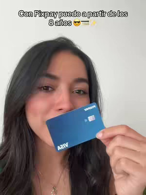 A woman with dark hair holds a blue credit card in front of her face, near her mouth. Text overlays the image in a black font.