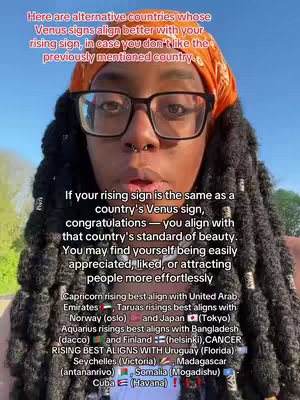 A woman wearing glasses and a headscarf is positioned in a close-up shot under sunlight, looking towards the camera. Text overlays provide information about astrology. The background is blurred, suggesting an outdoor setting.