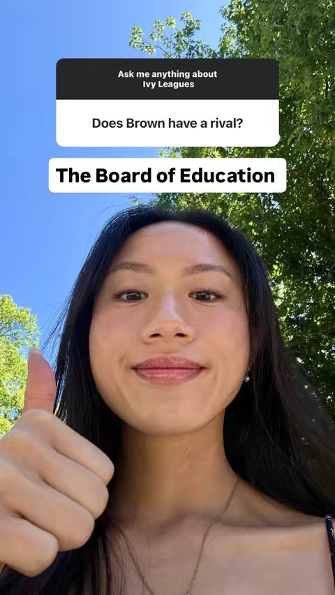 A selfie-style shot of a young woman smiling and giving a thumbs-up. She is positioned in front of a bright blue sky and green trees, with text overlays in the upper and lower portions of the frame. The overall composition is well-lit with a focus on the woman's face.