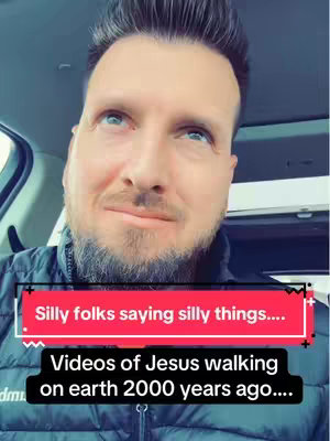 A man with short, styled brown hair and a beard looks upwards with a slightly amused expression. The shot is taken from inside a vehicle, and the background shows the interior of the car. Overlayed text reads 'Silly folks saying silly things...' and 'Videos of Jesus walking on earth 2000 years ago....'