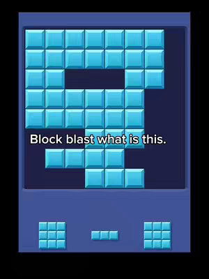 The cover image displays a game board from a block puzzle game, featuring a partially completed puzzle with turquoise blocks against a dark blue background. Below the main puzzle area are three rectangular blocks. At the bottom of the image, the text overlayed says 'Block blast what is this.'