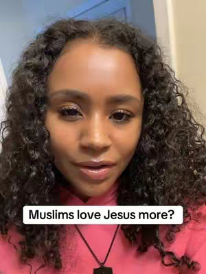 A close-up shot of a woman with curly dark hair, facing the camera. She's wearing a pink top and a black necklace. A text overlay reads, 'Muslims love Jesus more?'