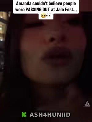 The cover image is a close-up selfie of a woman with dark hair, likely in a low-light setting. The upper half of her face is visible, with a focus on her mouth and eyes. The background is dark and indistinct. The image uses a dark color palette with soft lighting