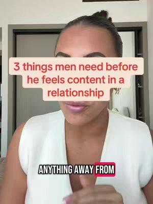 A woman with her hair pulled back is centered in the frame, positioned from the chest up, looking directly at the camera. A text overlay obscures part of the woman's face, and another, similar text appears beneath the person. The background is slightly blurred, suggesting an indoor setting.