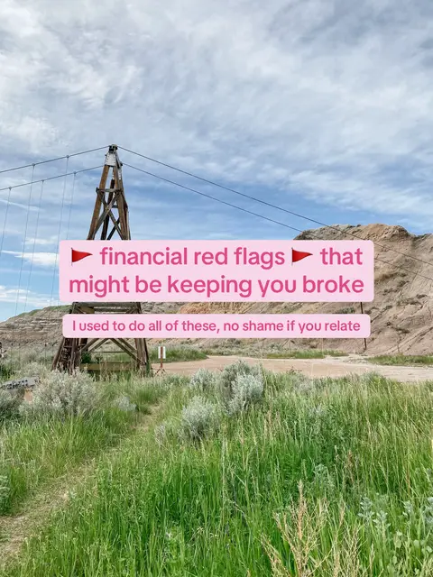 The image displays a landscape with a green field in the foreground and a structure towards the background. A text overlay is placed in the middle of the image showing pink text in different boxes.