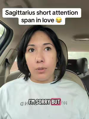 A woman in a car looking up with text overlay on top and at the bottom that reads "I\'M SORRY BUT ".