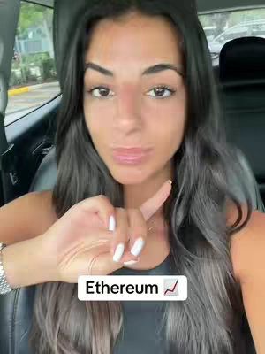 A woman with long, dark hair is seated in a car, looking directly at the camera with a slight smirk. She's wearing a black top, and the background subtly reveals a street scene. A text box at the bottom displays the word "Ethereum" alongside a rising line graph, symbolizing the cryptocurrency's value.