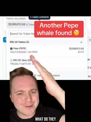 A man in a black shirt is shown in a selfie perspective with a screen behind him showing a crypto asset. The screen has text about a whale found and a snapshot of crypto token data. The man is gesturing with his right hand and has a surprised expression.