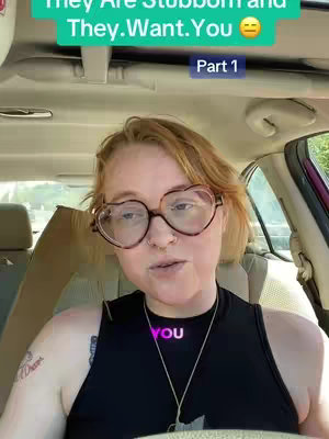 A woman with fair skin and red hair is positioned in the driver's seat of a car, looking towards the camera. She's wearing heart-shaped glasses and a sleeveless top, with text overlays at the top of the image and the word 'you' in the center of the frame.