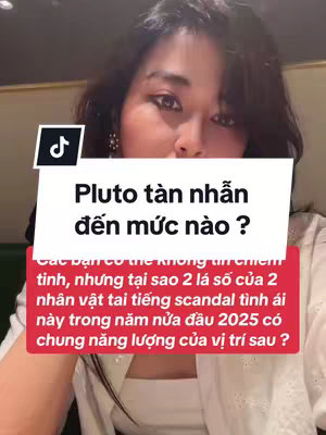 A woman's face dominates the frame, slightly tilted towards the left. She has dark hair and is looking at the camera. Overlaying her is text at the top and a red box near the bottom. The background is blurred and dark.