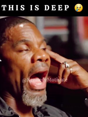 The cover image shows a close-up of a Black man with a short grey beard and his mouth open, suggesting he is speaking or reacting. He has a finger to his temple. Overlaid at the top is white text 'THIS IS DEEP' and a crying emoji. The username '@KennedyMotivate' is positioned at the bottom.