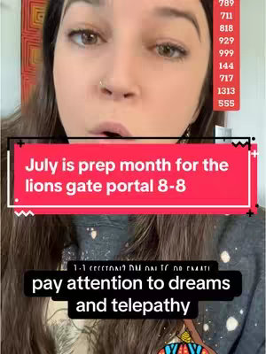 The image is a selfie-style shot featuring a woman from the chest up, with a focus on her face and upper body. Behind her, a red and orange painting is displayed. The woman's face has a slight upward angle, and she has long, dark hair. There are overlaid text boxes in the frame above and below the woman. The text on the top box reads, 'July is prep month for the lions gate portal 8-8'. The bottom text, a smaller and less prominent portion, says 'pay attention to dreams and telepathy'. On the right side, a list of numbers appears to be a reference guide.