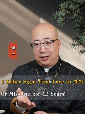 The cover image features a middle-aged man with glasses in front of a brown gradient background. The man is bald with a fringe of dark hair, wearing a dark patterned top with a white undershirt and a necklace. Above the man's left shoulder is a red rectangular shape with Chinese characters, and to the right is a small branch of green foliage. The text overlay reads "3 Zodiac Signs Find Love in 2024 Or Miss Out for 12 Years!"