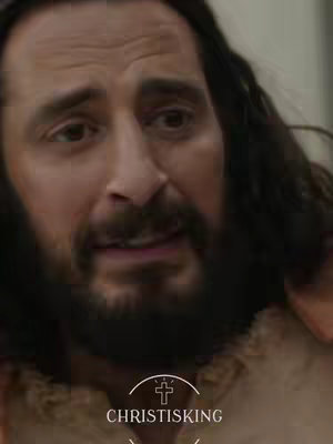 A close-up shot of a man with a beard and long dark hair. The man has a concerned expression. In the lower part of the image, there is a logo that says "CHRISTISKING" along with a stylized cross.