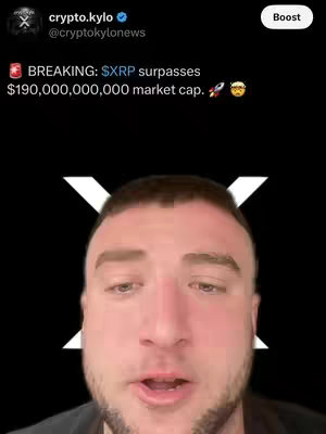 A selfie-style video thumbnail featuring a man's face filling almost the entire frame. The man has light skin, short brown hair, and a beard. Superimposed above his head is information from a news outlet including the text "BREAKING: $XRP surpasses $190,000,000,000 market cap." There is a large white "X" shape behind his head and the background is black.