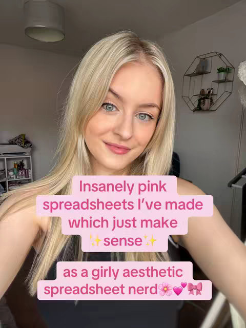 A selfie-style video cover image featuring a young blonde woman with fair skin and blue eyes. She is positioned in the center, with her head and shoulders visible, looking directly at the camera with a slight smile. On top of her image, there are rectangular text boxes in a light, pink color containing the hook text. The background shows a glimpse of a room with a ceiling light, a wall, and some decor.