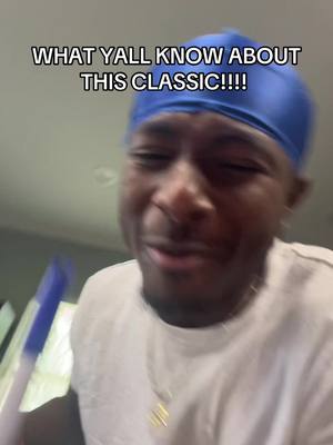 The cover image shows a young Black man with a concerned or emotional facial expression. He is wearing a white t-shirt and a blue durag. Above him, there is white text overlaid on the image.