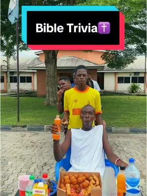 The cover image shows three young men in front of a building. Above them is a banner that reads 'Bible Trivia'. The man in the front is holding a bottle of orange soda and a food container. There is a table with snacks and drinks in front of them. The overall impression of the image is one of casual fun and engagement.