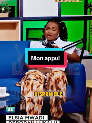 A woman with braided hair sits on a blue couch in a studio setting. She is positioned behind a microphone with a studio light visible to the right. Text overlays include the title "Mon appui" on a black and teal box, and "DISPONIBLE" within an orange box. A lower text box displays artist names.