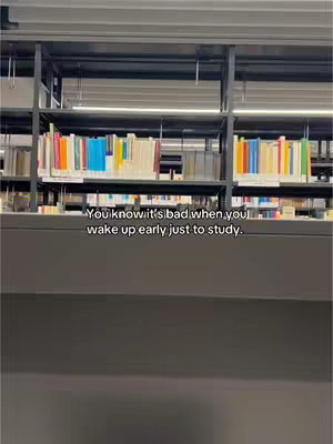 The image shows a section of a library with bookshelves filled with books. Overlaid at the bottom is a text hook.