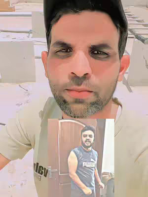 A selfie-style shot featuring a man in the foreground, captured from the chest up. The man, wearing a black cap, is positioned in the center of the frame, directly facing the camera with a neutral expression. A secondary image, or insert, is visible in the center, showcasing the individual in another setting. The background appears to be an unfinished construction site, with raw concrete and exposed elements.