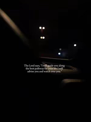 A dark, vertical image with a blurred, out-of-focus background suggesting a road or street at night, illuminated by a few distant lights. In the foreground, a bright, angled light streak crosses the upper left, adding contrast. Text appears on the lower third of the image, written in a white, simple font.