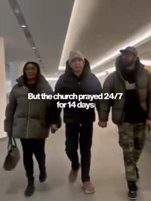 The cover image shows three people walking down a brightly lit hallway. They are all wearing puffer jackets and appear to be in a modern, public space. Text overlaid at the bottom says, "But the church prayed 24/7 for 14 days".