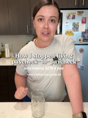 A woman stands in a kitchen setting with a glass in the foreground. Text overlays explain the video's topic: financial advice.
