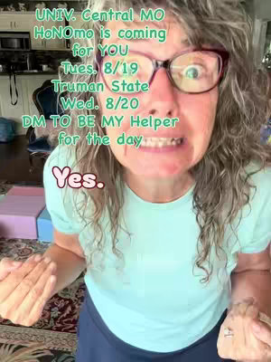 A selfie-style video cover with a woman in the center, wearing glasses and a light blue t-shirt. Text overlays in green and pink announce upcoming events and ask for help. She has light-colored hair and a slightly concerned expression.