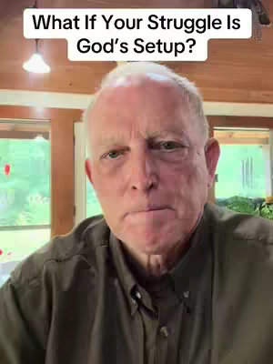 The image features an older man in a close-up shot. He's wearing a button-down shirt, and the background includes an interior scene with windows. Text overlayed on the image reads "What If Your Struggle Is God's Setup?"