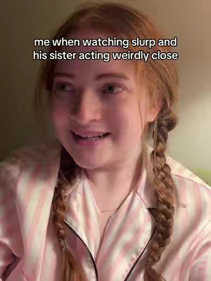 A woman with auburn hair in braids, wearing a pink-striped pajama top, is looking slightly to the side with a soft expression, likely speaking, and there's text overlaid on the top.