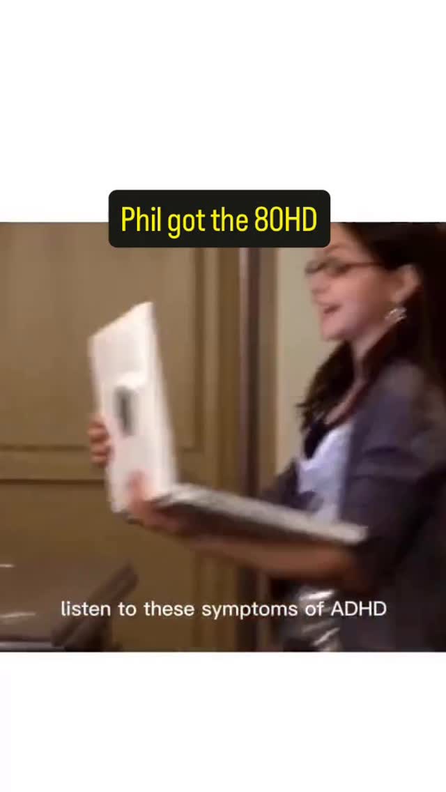 The cover image features a shot of a scene from the show Modern Family. A woman with glasses holds a laptop. Overlay text box is present, with the text "Phil got the 80HD" in a dark background color and text  "listen to these symptoms of ADHD" positioned on a white background.