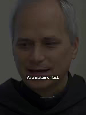 The cover image features a medium shot of a man with gray hair, wearing a dark garment that appears to be a clerical collar. The background is plain and light-colored, and the man is looking towards the camera. Text overlayed at the bottom of the image reads 'As a matter of fact,' in a white, sans-serif font.